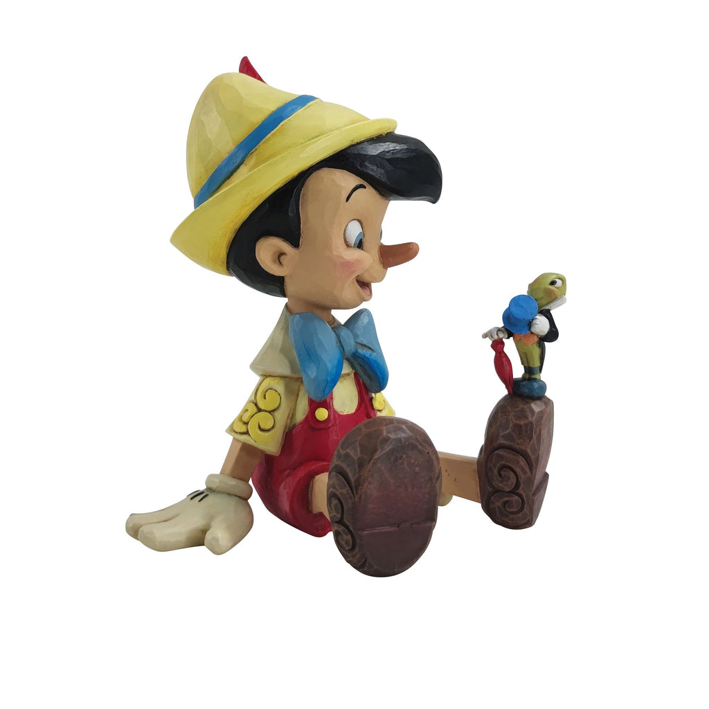 Photographie Pinocchio Toy Statue isolated on white - Acheter-le