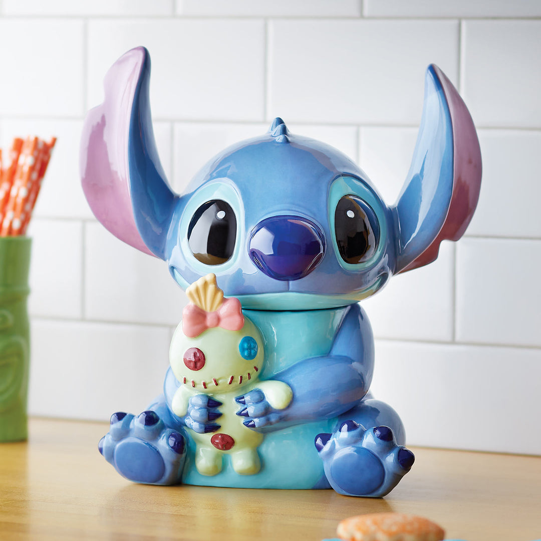 Animated character figurine on a kitchen counter with a tiled wall background